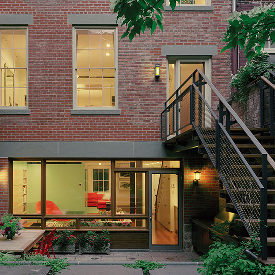 This Greenwich Village landmark district historic townhouse renovation and enlargement includes a finished garden, outdoor room and an improved penthouse level.